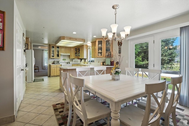 36 N Main St, Mantua, UT 84324 - dining room featuring recessed lighting, a chandelier, and light tile patterned flooring