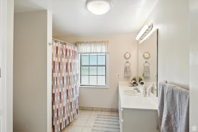 36 N Main St, Mantua, UT 84324 - bathroom featuring tile patterned flooring, vanity, a shower with shower curtain, and a textured ceiling