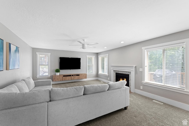 1060 E 1100 N, Pleasant Grove, UT 84062 - carpeted living room with ceiling fan, a fireplace, and recessed lighting