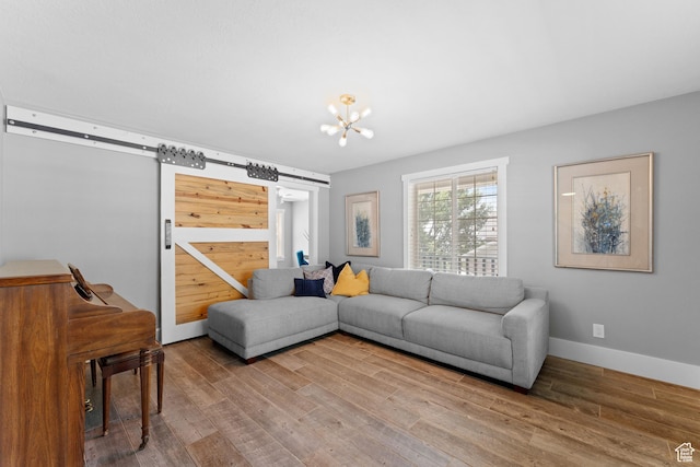 1060 E 1100 N, Pleasant Grove, UT 84062 - living room featuring a barn door, wood finished floors, and a chandelier