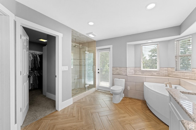 1060 E 1100 N, Pleasant Grove, UT 84062 - full bathroom with a stall shower, tile walls, recessed lighting, a bath, and a wainscoted wall