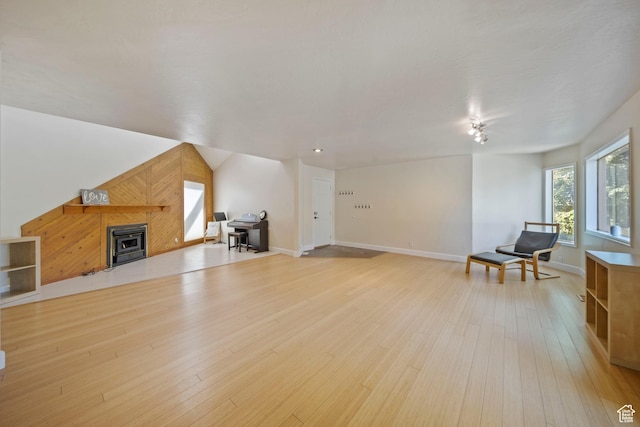 8463 S Jackson Hole Dr E, Sandy, UT 84093 - living area featuring light wood-style flooring and baseboards