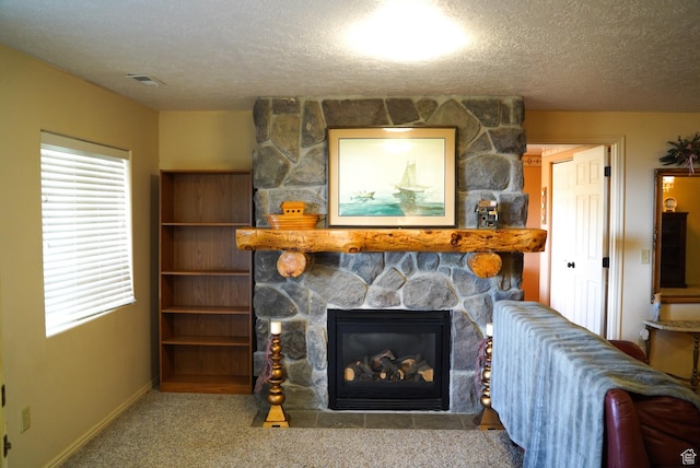 11495 E 16000 N, Mount Pleasant, UT 84647 - living area with a fireplace, a textured ceiling, and carpet floors