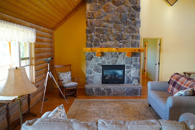 11495 E 16000 N, Mount Pleasant, UT 84647 - living room featuring log walls, wooden ceiling, wood finished floors, a stone fireplace, and vaulted ceiling