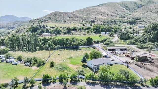3229 E Riverdale Rd, Preston, ID 83263 - drone / aerial view of a mountain backdrop