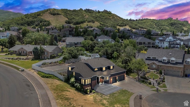 4104 S Bridlewood Dr E, Bountiful, UT 84010 - aerial view at dusk of a residential view and a mountain view