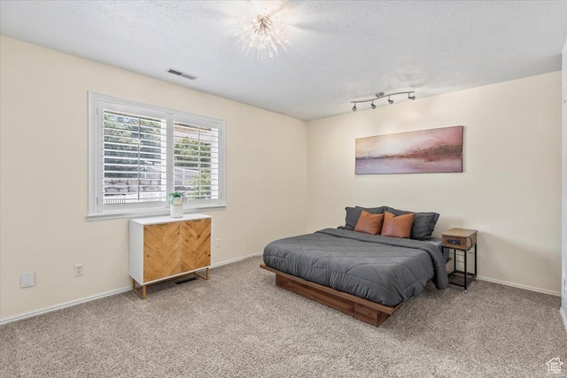 4104 S Bridlewood Dr E, Bountiful, UT 84010 - bedroom featuring carpet floors and a textured ceiling