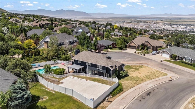 4104 S Bridlewood Dr E, Bountiful, UT 84010 - aerial perspective of suburban area with mountains and a pool
