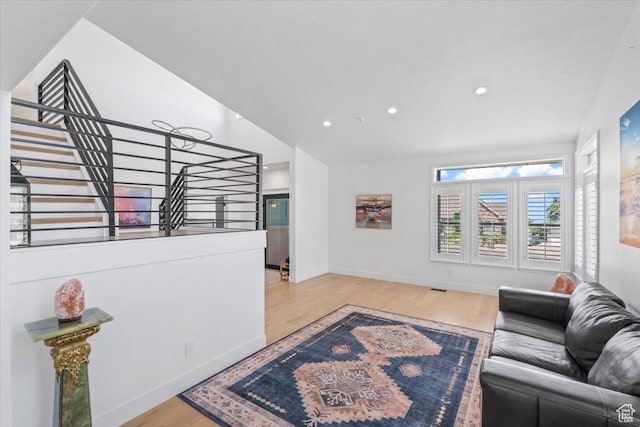 4104 S Bridlewood Dr E, Bountiful, UT 84010 - living room with wood finished floors, recessed lighting, and lofted ceiling