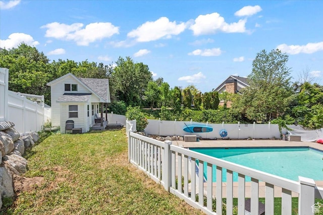 4104 S Bridlewood Dr E, Bountiful, UT 84010 - view of swimming pool with a fenced backyard, an outdoor structure, and view of wooded area