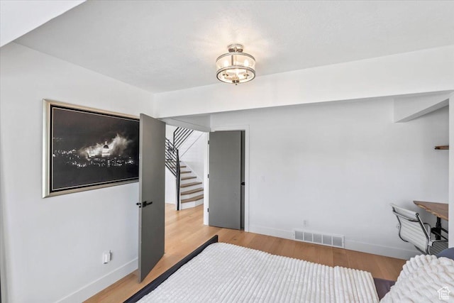 4104 S Bridlewood Dr E, Bountiful, UT 84010 - bedroom featuring light wood-style flooring and baseboards