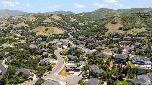 4104 S Bridlewood Dr E, Bountiful, UT 84010 - aerial view of property's location with a mountainous background and nearby suburban area