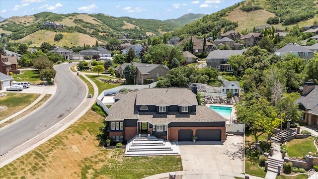 4104 S Bridlewood Dr E, Bountiful, UT 84010 - aerial view of residential area featuring a mountain backdrop