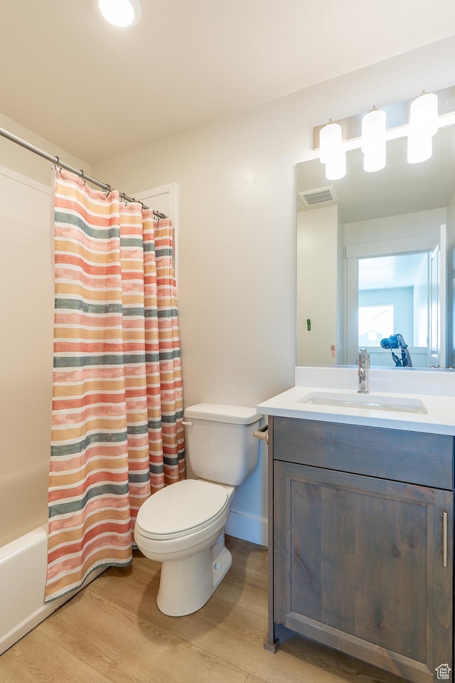536 N 770 W, Smithfield, UT 84335 - bathroom with vanity, wood finished floors, and shower / bathtub combination with curtain