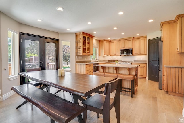 3035 S Big Hollow Rd, Heber City, UT 84032 - dining space with french doors, plenty of natural light, recessed lighting, and light wood-type flooring