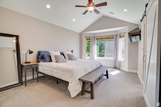 3035 S Big Hollow Rd, Heber City, UT 84032 - bedroom featuring light carpet, recessed lighting, lofted ceiling, a barn door, and a ceiling fan