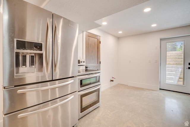3035 S Big Hollow Rd, Heber City, UT 84032 - kitchen featuring appliances with stainless steel finishes, recessed lighting, and concrete flooring