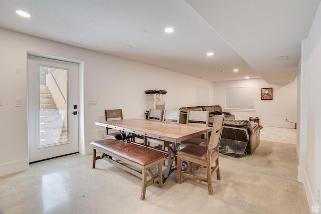 3035 S Big Hollow Rd, Heber City, UT 84032 - dining area featuring finished concrete flooring, recessed lighting, and stairway