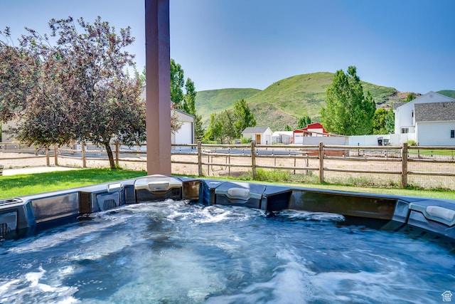 3035 S Big Hollow Rd, Heber City, UT 84032 - view of patio featuring a hot tub and a mountain view