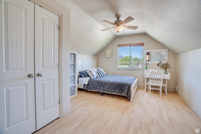 3035 S Big Hollow Rd, Heber City, UT 84032 - bedroom with wood finished floors, a textured ceiling, lofted ceiling, and a ceiling fan
