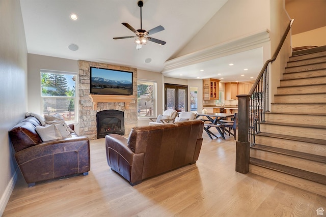 3035 S Big Hollow Rd, Heber City, UT 84032 - living area featuring stairway, light wood-style flooring, a fireplace, a ceiling fan, and recessed lighting