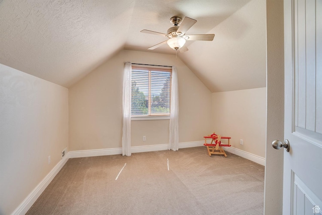 3035 S Big Hollow Rd, Heber City, UT 84032 - additional living space with carpet flooring, vaulted ceiling, ceiling fan, and a textured ceiling