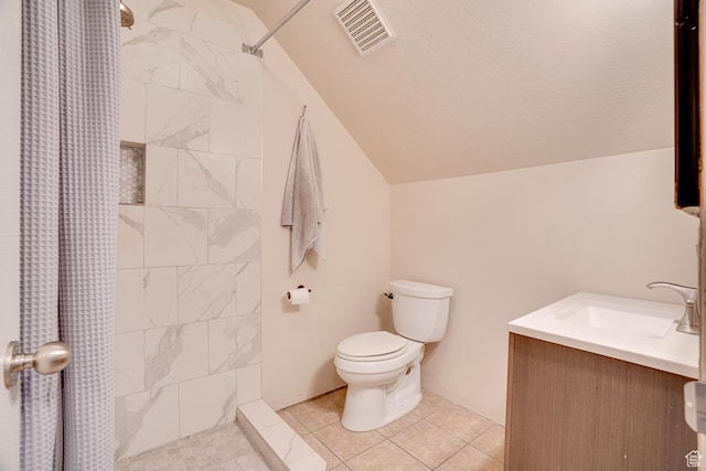 3035 S Big Hollow Rd, Heber City, UT 84032 - bathroom with vaulted ceiling, a tile shower, and vanity