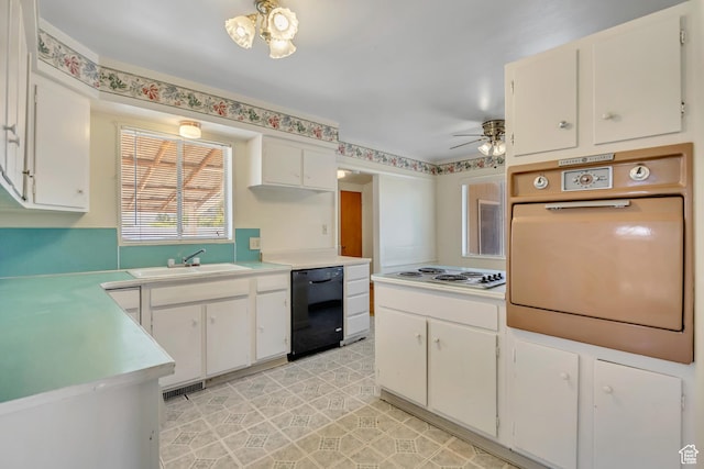3409 S Maple Way, Salt Lake City, UT 84119 - kitchen featuring dishwasher, oven, ceiling fan, and white cabinetry