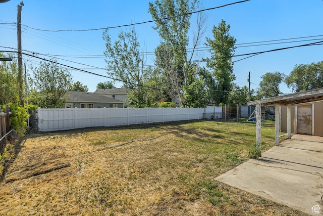 3409 S Maple Way, Salt Lake City, UT 84119 - fenced backyard with a patio area