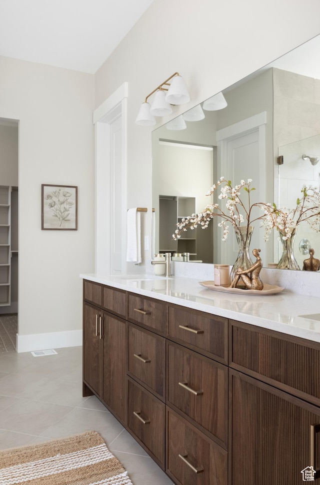 14277 S Keely Ct, Bluffdale, UT 84065 - full bath featuring double vanity, tile patterned flooring, and a shower
