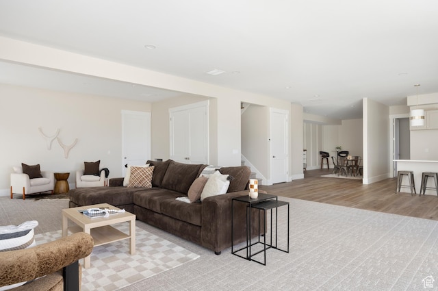 14277 S Keely Ct, Bluffdale, UT 84065 - living room featuring light wood-style floors and stairs