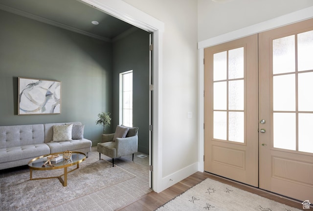 14277 S Keely Ct, Bluffdale, UT 84065 - entryway with french doors, wood finished floors, and ornamental molding