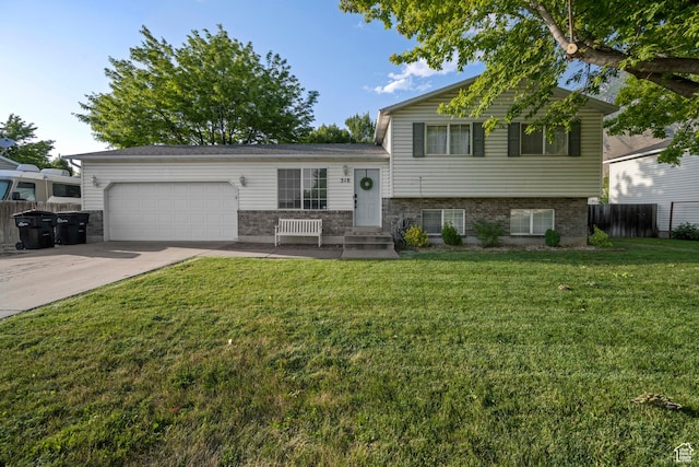 318 W 850 N, Springville, UT 84663 - split level home with an attached garage, driveway, and brick siding