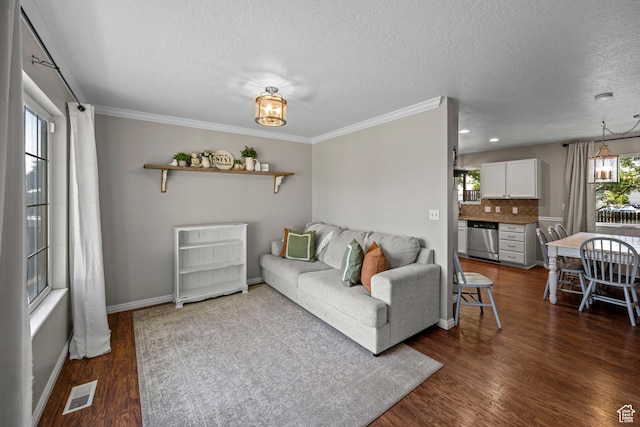 318 W 850 N, Springville, UT 84663 - living area with a textured ceiling, dark wood-type flooring, ornamental molding, and recessed lighting