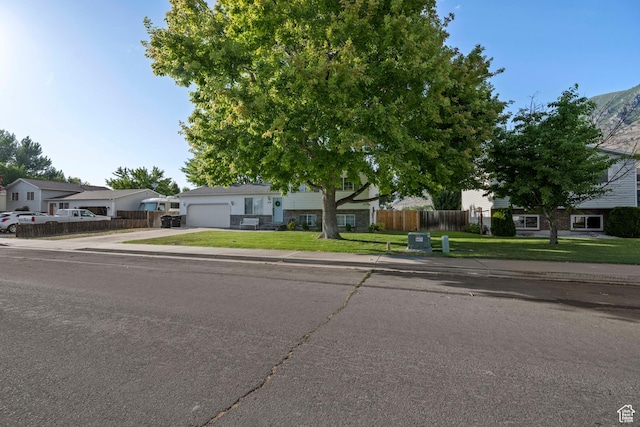 318 W 850 N, Springville, UT 84663 - view of front of home with concrete driveway and an attached garage