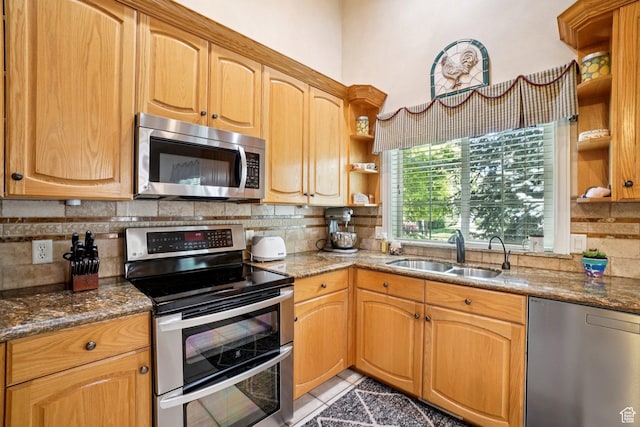 798 E Spruce Tree Ln, Sandy, UT 84094 - kitchen featuring appliances with stainless steel finishes, open shelves, decorative backsplash, and dark stone countertops