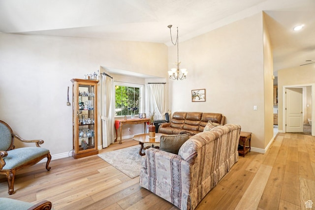 798 E Spruce Tree Ln, Sandy, UT 84094 - living room with vaulted ceiling, light wood-type flooring, and a chandelier