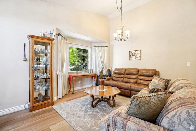 798 E Spruce Tree Ln, Sandy, UT 84094 - living area with light wood-style flooring and a chandelier