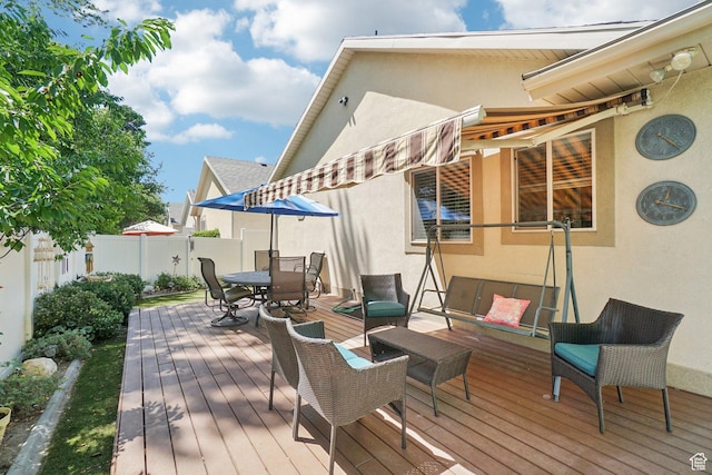 798 E Spruce Tree Ln, Sandy, UT 84094 - wooden deck featuring outdoor dining space