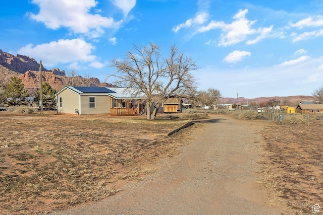 2627 E Cactus Rd, Moab, UT 84532 - view of dirt / gravel road featuring a mountain view