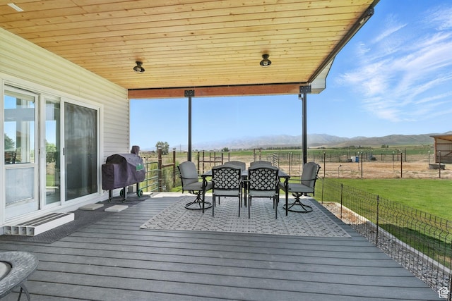 968 S 5400 W, Malad City, ID 83252 - deck with a mountain view, a grill, and outdoor dining area