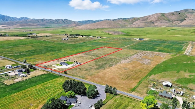 968 S 5400 W, Malad City, ID 83252 - overview of rural landscape with property parcel outlined and a mountain backdrop