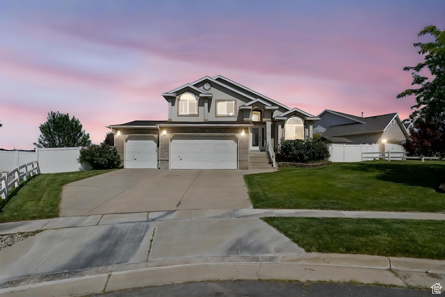 2177 N 125 W, Layton, UT 84041 - view of front of house featuring concrete driveway, stucco siding, and a garage