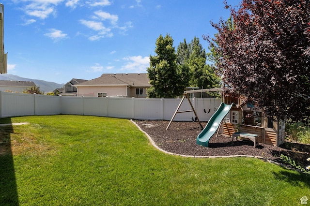 2177 N 125 W, Layton, UT 84041 - fenced backyard featuring a playground