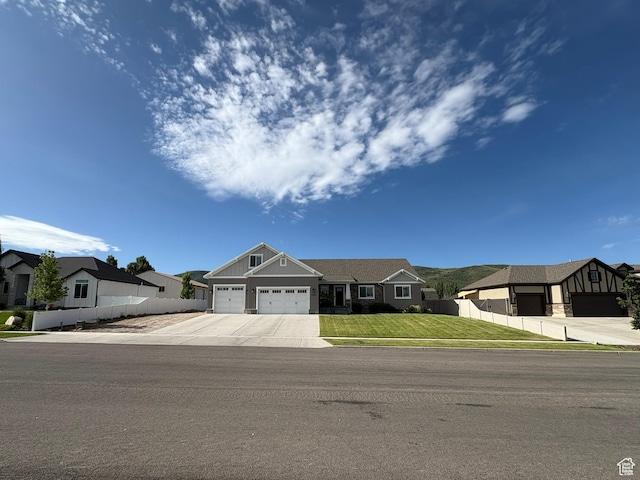 966 E 2810 S, Heber City, UT 84032 - view of front of home with a residential view, a garage, and concrete driveway