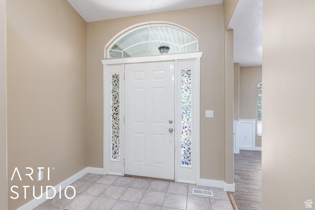 2063 N 775 E, North Ogden, UT 84414 - foyer featuring light tile patterned floors and baseboards