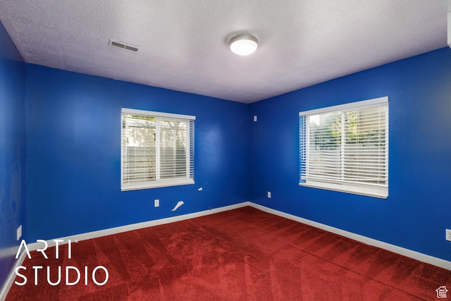 2063 N 775 E, North Ogden, UT 84414 - carpeted empty room featuring healthy amount of natural light and a textured ceiling