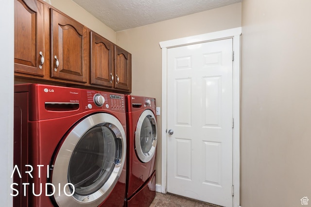 2063 N 775 E, North Ogden, UT 84414 - laundry room featuring separate washer and dryer, cabinet space, and a textured ceiling