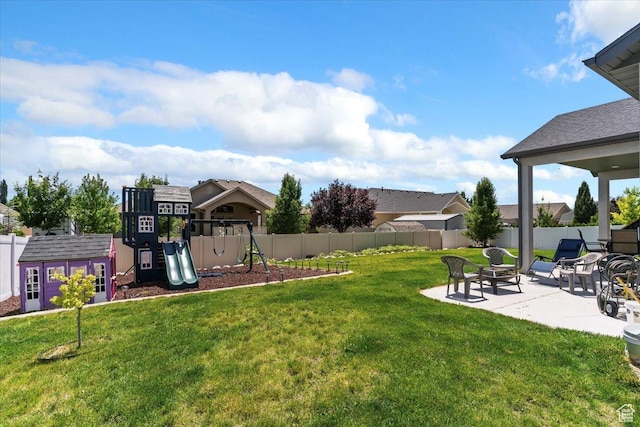 1381 W 425 S, Layton, UT 84041 - fenced backyard with a patio, a playground, and an outdoor structure