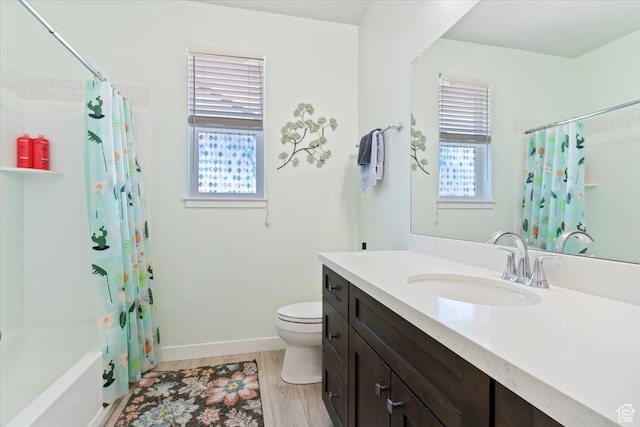 1381 W 425 S, Layton, UT 84041 - full bathroom with healthy amount of natural light, vanity, shower / bath combo, and wood finished floors